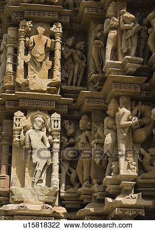 Stock Image - Sculptures on a temple, Lakshmana Temple, Khajuraho, Chhatarpur District, Madhya Pradesh, India. Fotosearch