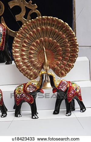 Showpieces at a market stall, Delhi, India View Large Photo Image Stock Image - Showpieces at a market stall, Delhi, India. Fotosearch