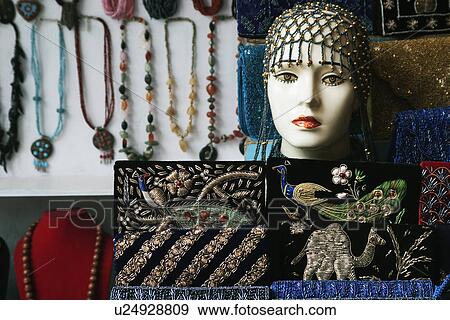 Stock Photo - Showpieces with necklaces at a market stall, Delhi, India. Fotosearch