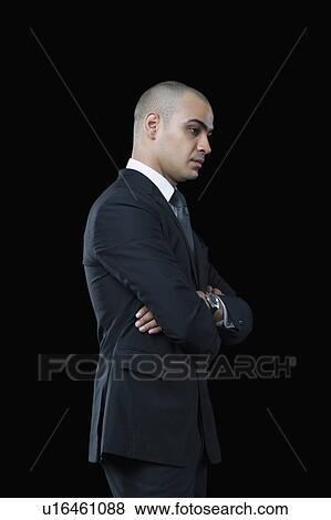 Side profile of a businessman thinking View Large Photo Image Stock Photo - Side profile of a businessman thinking. Fotosearch