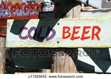 Stock Image - Signboard of cold beer at a cafe, Scheveningen, The Hague, Netherlands. Fotosearch