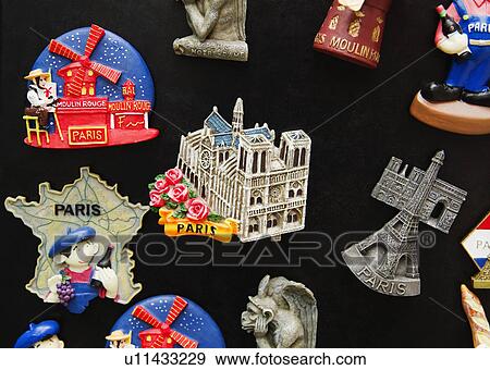 Stock Photo - Souvenirs at a market stall, Paris, France. Fotosearch