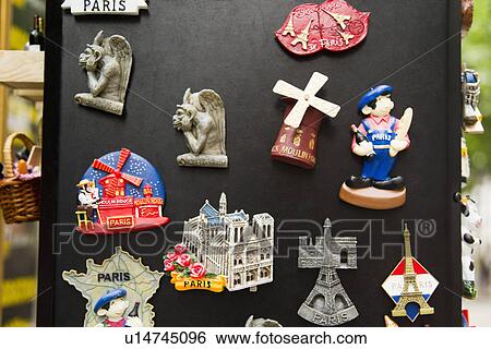 Stock Photograph - Souvenirs at a market stall, Paris, France. Fotosearch