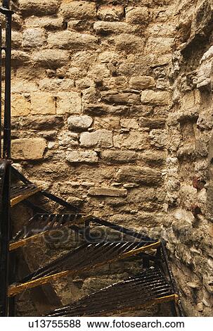 Staircase along a stone wall View Large Photo Image Stock Photo - Staircase along a stone wall. Fotosearch