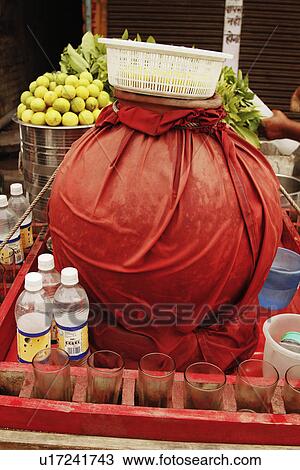 Stock Image - Stall for Jal jeera the traditional Indian beverage. Fotosearch