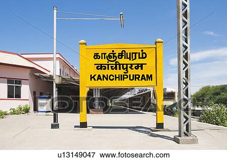 Station name board at a railroad station, Kanchipuram, Tamil Nadu, India View Large Photo Image Stock Photo - Station name board at a railroad station, Kanchipuram, Tamil Nadu, India. Fotosearch