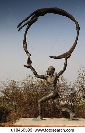 Stock Image - Statue in a garden, Garden of Five Senses, Saidul Ajaib, New Delhi, India. Fotosearch