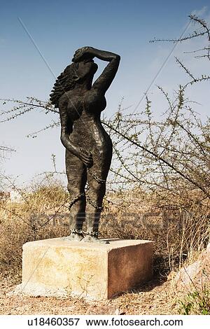 Stock Photo - Statue in a garden, Garden of Five Senses, Saidul Ajaib, New Delhi, India. Fotosearch