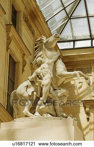 Statue in a museum, Musee du Louvre, Paris, France View Large Photo Image Stock Image - Statue in a museum, Musee du Louvre, Paris, France. Fotosearch