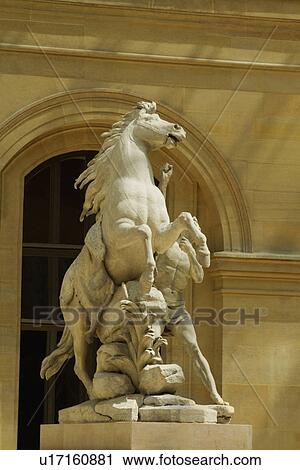 Statue in a museum, Musee du Louvre, Paris, France View Large Photo Image Stock Image - Statue in a museum, Musee du Louvre, Paris, France. Fotosearch