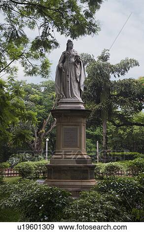 Statue of Queen Victoria in a park, Cubbon Park, Bangalore, Karnataka, India View Large Photo Image Stock Photo - Statue of Queen Victoria in a park, Cubbon Park, Bangalore, Karnataka, India. Fotosearch