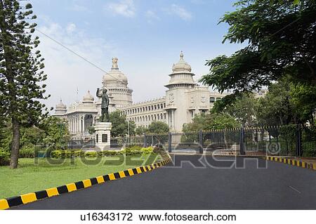 Stock Image - Statue of Subhas Chandra Bose in front of a government building, Vidhana Soudha, Bangalore, Karnataka, India. Fotosearch