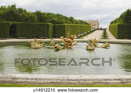 Stock Photography - Statues in a pool, Chateau de Versailles, Versailles, Paris, France. Fotosearch