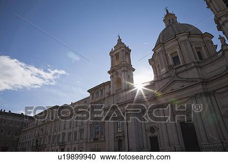 Sun shining behind a church, Church of SantAgnese in Agone, Piazza Navona, Rome, Lazio, Italy View Large Photo Image Stock Image - Sun shining behind a church, Church of SantAgnese in Agone, Piazza Navona, Rome, Lazio, Italy. Fotosearch