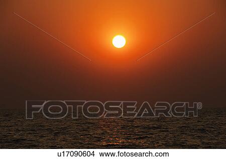 Picture - Sunset over the sea, Goa, India. Fotosearch
