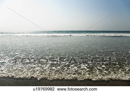 Surf on the beach, Goa, India View Large Photo Image Stock Image - Surf on the beach, Goa, India. Fotosearch