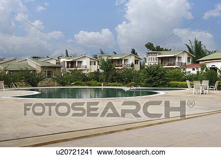 Swimming pool in front of tourist resorts, Jim Corbett National Park, Nainital, Uttarakhand, India View Large Photo Image Stock Image - Swimming pool in front of tourist resorts, Jim Corbett National Park, Nainital, Uttarakhand, India. Fotosearch
