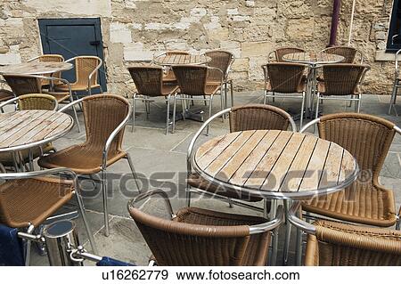 Tables and chairs at an outdoor cafe, Oxford, Oxfordshire, England View Large Photo Image Stock Photo - Tables and chairs at an outdoor cafe, Oxford, Oxfordshire, England. Fotosearch
