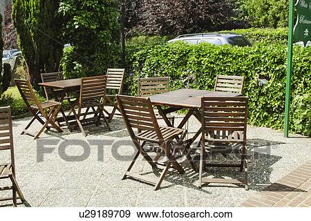 Stock Photo - Tables and chairs in a restaurant, Adare, County Limerick, Republic of Ireland. Fotosearch