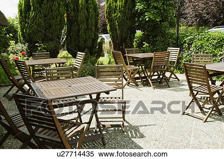Stock Photography - Tables and chairs in a restaurant, Adare, County Limerick, Republic of Ireland. Fotosearch