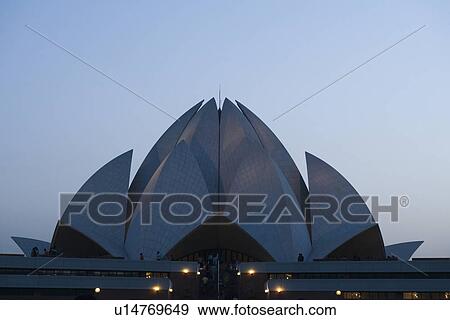 Stock Photo - Temple lit up at dusk, Lotus Temple, New Delhi, India. Fotosearch