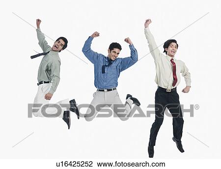 Stock Image - Three businessmen jumping. Fotosearch