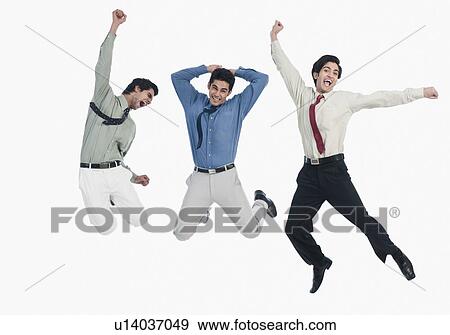 Three businessmen jumping View Large Photo Image Stock Photo - Three businessmen jumping. Fotosearch
