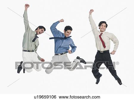 Three businessmen jumping View Large Photo Image Stock Photograph - Three businessmen jumping. Fotosearch