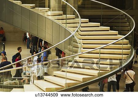 Stock Photo - Tourists at a museum, Louvre Pyramid, Musee du Louvre, Paris, France. Fotosearch