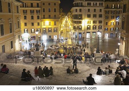 Stock Photo - Tourists sitting on Spanish Steps, Piazza Di Spagna, Rome, Lazio, Italy. Fotosearch
