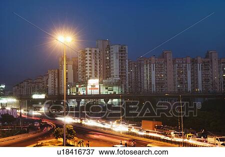 Traffic on the road at night, IFFCO Chowk, Gurgaon, Haryana View Large Photo Image Stock Photo - Traffic on the road at night, IFFCO Chowk, Gurgaon, Haryana. Fotosearch