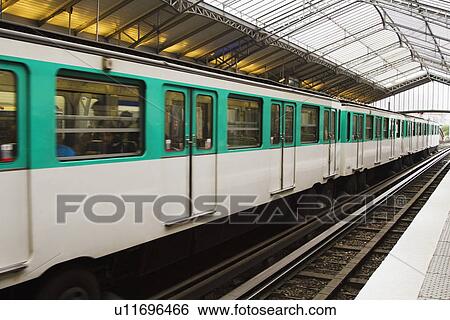 Train at a station, Paris, France View Large Photo Image Stock Photograph - Train at a station, Paris, France. Fotosearch