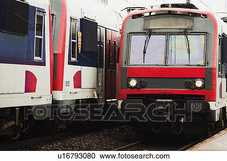 Trains at a station, Paris, France View Large Photo Image Stock Image - Trains at a station, Paris, France. Fotosearch
