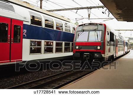 Stock Image - Trains at a station, Paris, France. Fotosearch