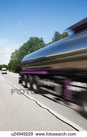 Stock Photo - Truck moving on the road, Cesky Krumlov, South Bohemian Region, Czech Republic. Fotosearch
