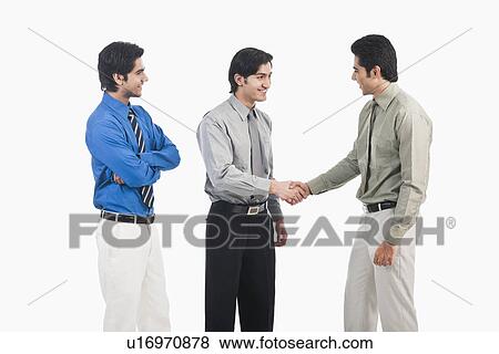 Two businessmen shaking hands View Large Photo Image Stock Photo - Two businessmen shaking hands. Fotosearch