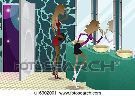 Stock Image - Two women applying make-up in a bathroom. Fotosearch