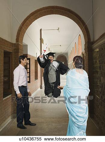 University student celebrating after getting his diploma View Large Photo Image Stock Photography - University student celebrating after getting his diploma. Fotosearch