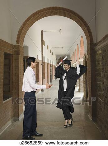 Stock Photo - University student celebrating. Fotosearch