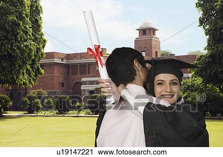 University student hugging her father View Large Photo Image Stock Image - University student hugging her father. Fotosearch