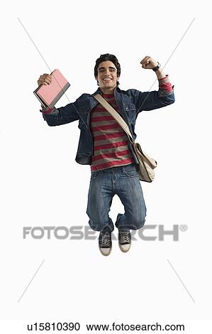 Stock Image - University student jumping in excitement. Fotosearch