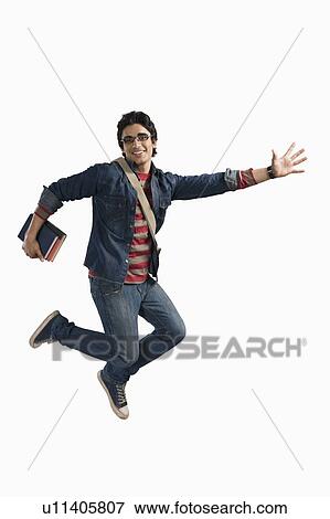 University student jumping in excitement View Large Photo Image Stock Photo - University student jumping in excitement. Fotosearch
