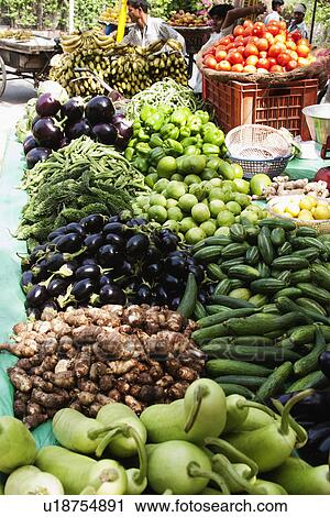 Vegetables at a market stall, Delhi, India View Large Photo Image Stock Image - Vegetables at a market stall, Delhi, India. Fotosearch