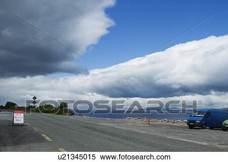 Stock Photography - Vehicle parked at the lakeside, Lakes of Killarney, Ring Of Kerry, County Kerry, Republic of Ireland. Fotosearch