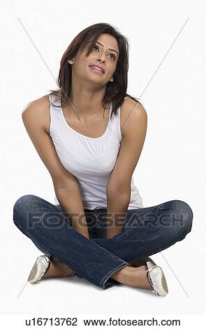 Stock Image - Woman day dreaming. Fotosearch