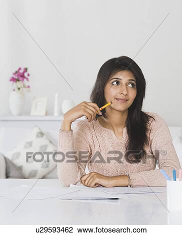 Woman day dreaming View Large Photo Image Stock Image - Woman day dreaming. Fotosearch