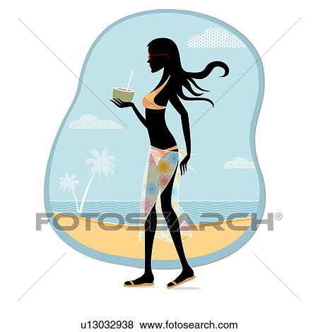 Stock Photo - Woman enjoying coconut water on the beach. Fotosearch