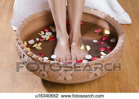 Woman getting a pedicure treatment View Large Photo Image Stock Image - Woman getting a pedicure treatment. Fotosearch