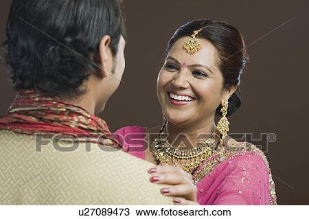 Stock Image - Woman looking at her son and smiling. Fotosearch