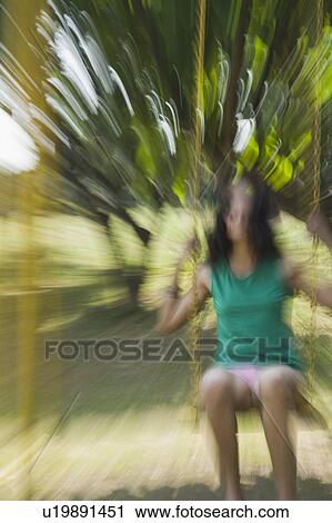 Woman on a swing View Large Photo Image Stock Image - Woman on a swing. Fotosearch